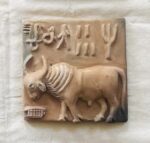 bull grazing harappa seal